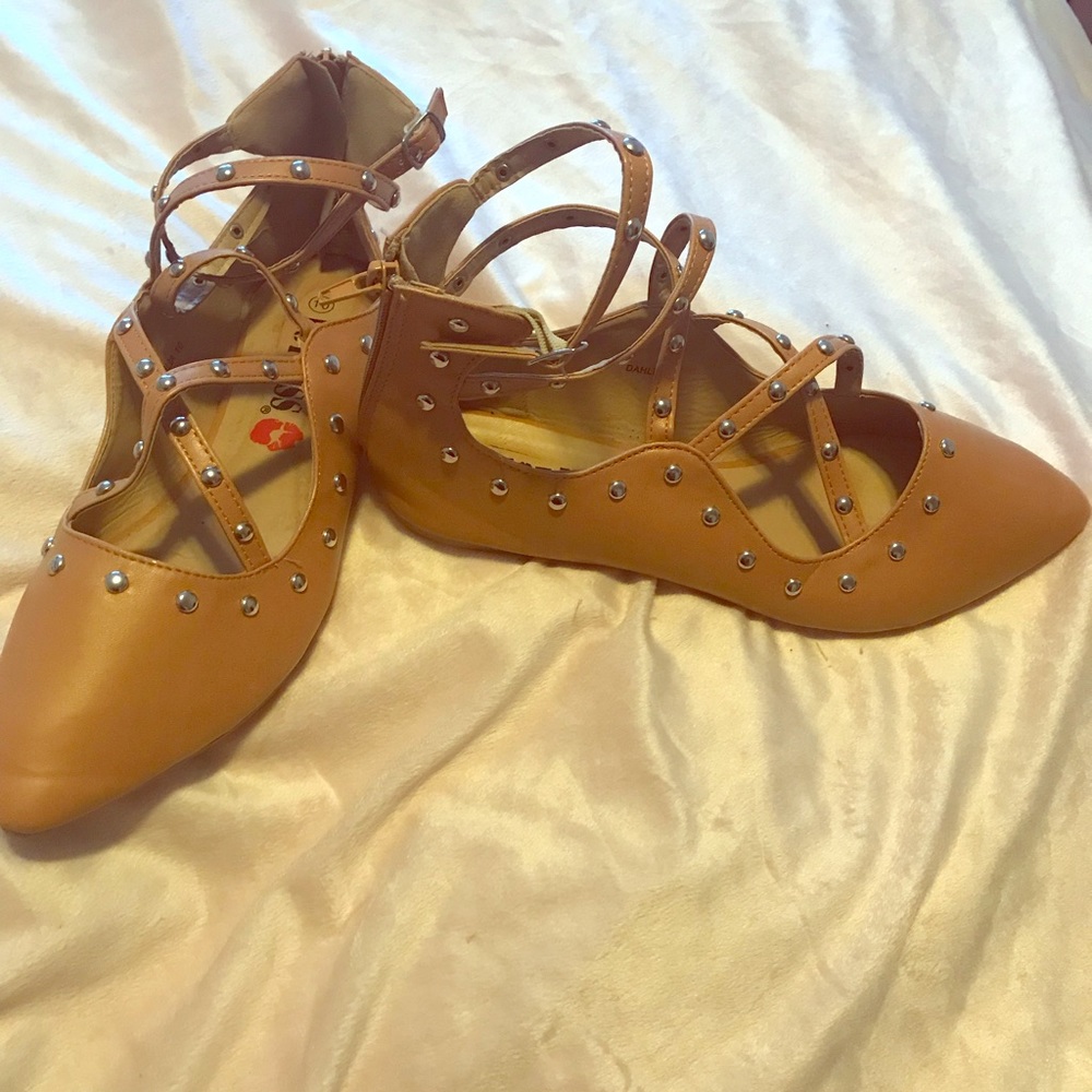 Tan studded flats